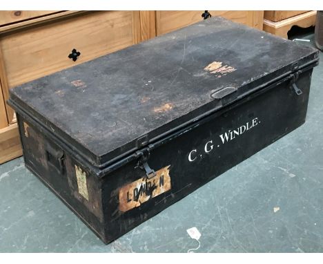 A metal travel trunk, with loop carry handles, marked C.G Windle, 91x49x30cmH 