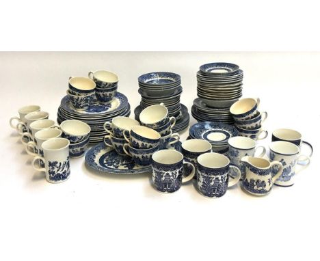 A lot of blue and white willow pattern china, various makers including Churchill, Woods Ware, Wessex Collection, Broadhurst, 