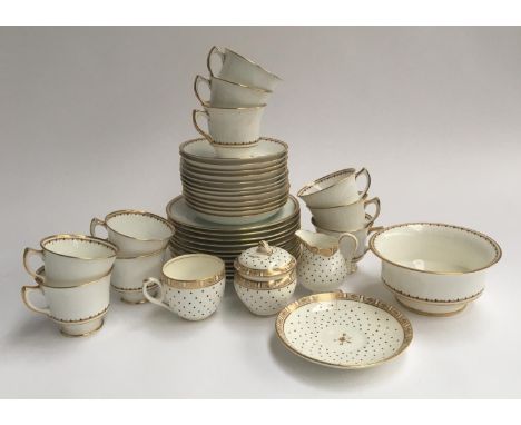 A Grosvenor 'Ye Olde English' part tea service, heightened in gilt, approx. 38 pieces 