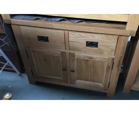 A contemporary light oak sideboard, two drawers over two cupboard doors, 97x46x78cmH 
