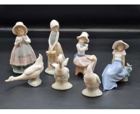 Seven Nao porcelain figures, largest 21cm high. (7) 