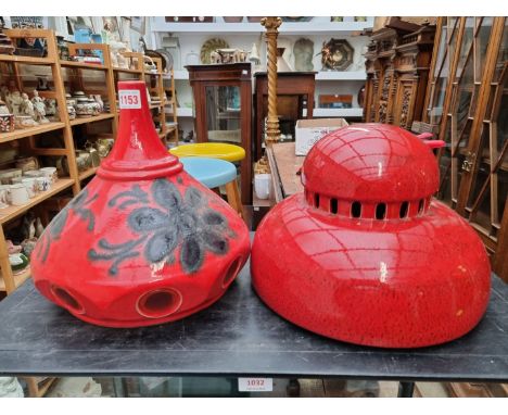 Two West German pottery light shades, largest 28cm. 