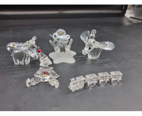 Swarovski: two 'Disney' Dumbo; together with a 1997 'Cheerful Times' clown puppet; a small four piece train; and a Preciosa s