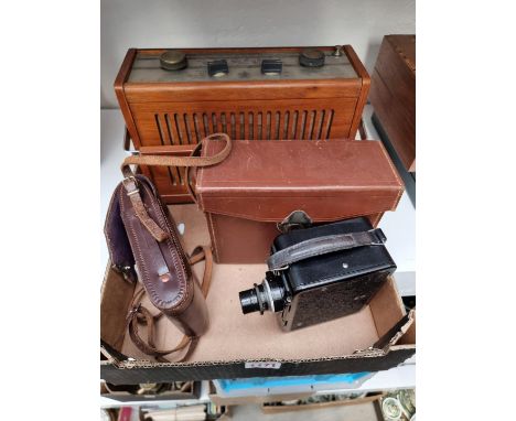 A Dynatron 'Sapphire' radio; together with a Dekko cine camera, cased; and another camera. (3) 