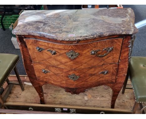 A small Louis XV kingwood and marble top commode, with brass mounts, 77.5cm wide.&nbsp; 