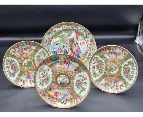 Four Chinese Canton enamel famille rose plates, late 19th century, largest 25.5cm diameter, (star crack to largest).&nbsp;&nb