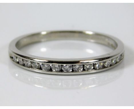 A platinum half eternity ring set with approx. 0.33ct diamonds 3.5g size R