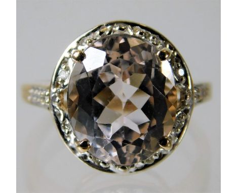 A 10ct gold morganite &amp; diamond cluster ring 3.5g size K/L