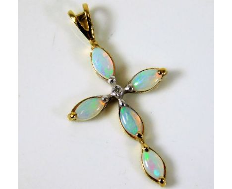 A 9ct gold diamond &amp; opal cross pendant 0.9g