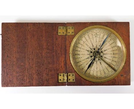 An antique compass box 3.5in x 3.5in