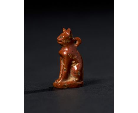 Egyptian cat amulet, carved from jasper, dates back to the Late Period to Ptolemaic Period (664-30 B.C.). The amulet showcase