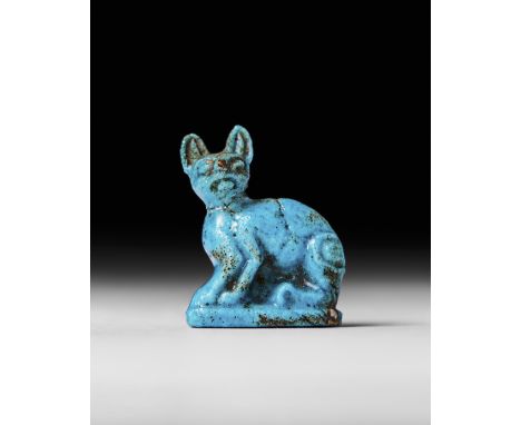 EGYPTIAN TURQUOISE FAIENCE AMULET OF A CAT, CIRCA 664-332 BC    Provenance: Private UK Collection&nbsp;    L: 3cm&nbsp;   