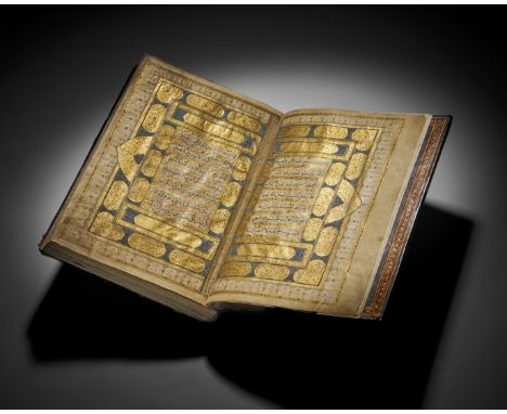 This impressive large illuminated QurÃ¢â‚¬â„¢an, originating from the Mughal era in India. The text is framed by intricate go