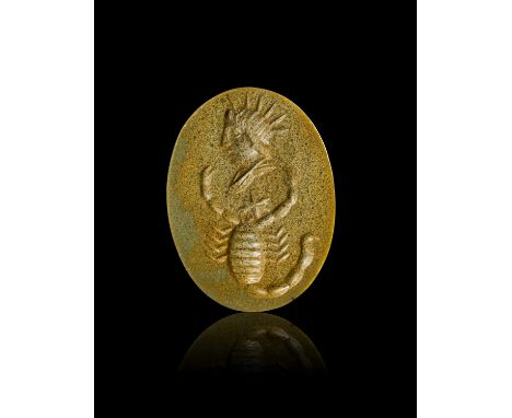 A GREEN STONE INTAGLIO DEPICTS HELIUS AND SCORPION, 2ND 3RD CENTURY A.D. OR LATER     L: 1.7cm 