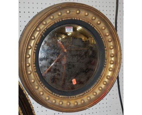 A 19th century giltwood circular convex wall mirror, dia. 46cm