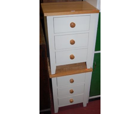 A pair of contemporary light oak and white painted three drawer bedside chests, w.45cm