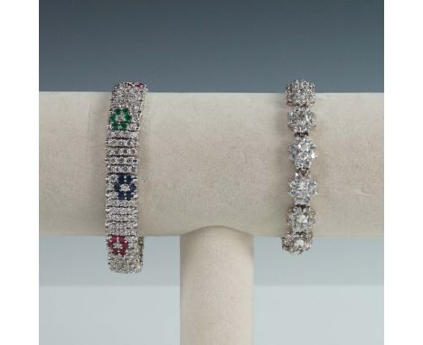 2pc bracelet lot including one Landau tennis bracelet featuring clear round stones with multicolor floral clusters, and one s