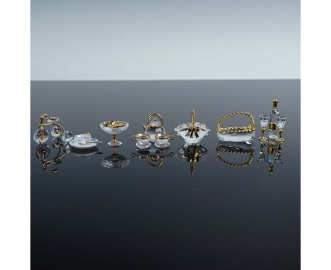 An exquisite collection of six Swarovski Crystal Memories Classics miniatures, each meticulously crafted in clear faceted cry
