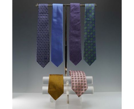 Lot of six designer neckties, all crafted in 100% silk, featuring a variety of textures, colors, and premium labels. Includes