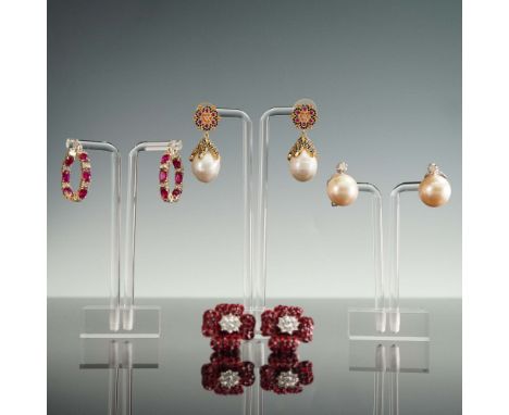 A refined and colorful set of four earring pairs, featuring three marked 925 sterling silver designs and one marked Landau. T
