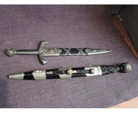 Two replica Swords, King Arthur blade length 27cm, overalll length 41cm and a Dirk made by Pooley Sword London, blade length 