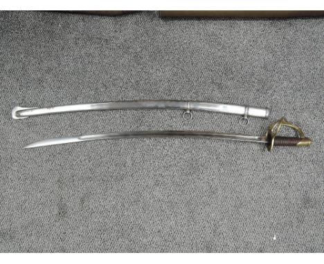 A US Cavalry Troopers Sword model 1860, blade inscribed US ADK1862 AMESMFGC CHIGCPEE MASS, leather grip, brass guard, curved 