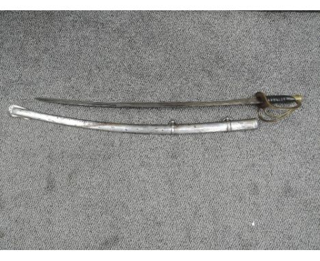 A possible US Cavalry Troopers Sword model 1860, plain blade with no makers marks seen, leather grip missing wire, brass guar