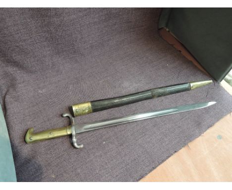 A German Seitengewehr M1871 Bayonet for the First Mauser Rifle, brass Hilt, 40cm Blade, blade marked GEBR WEVERSBERS Solingen