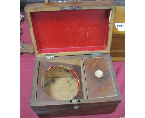 A XIX Century Mahogany Tea Caddy, with a ring handle, 22.5cms wide.