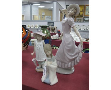 Lladro Figure of a Girl, in matt finish, 15.5cm high, two larger by Nao.