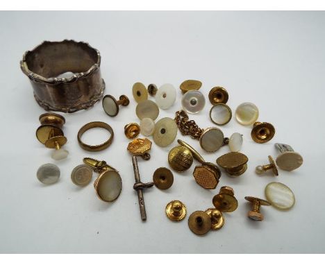 A collection of cufflinks, dress studs, yellow metal ring and a good quality hallmarked silver, Elkington &amp; Co napkin rin