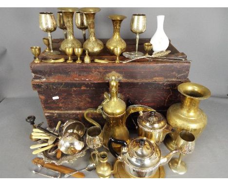 A quantity of metalware, brass and plated and a metal travelling trunk. [2]