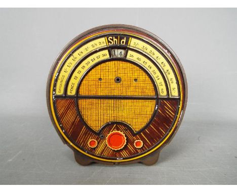 A vintage German tinplate money bank in the form of a valve radio, approximately 13 cm (h)