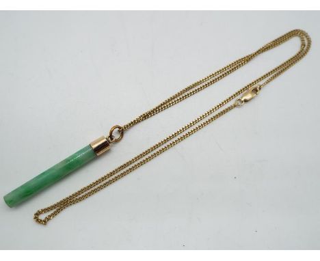 9 K gold - a 9 ct gold necklace, approximate 50 cm ( l), approx 4.65g and a yellow metal pendant set with jade, presumed gold