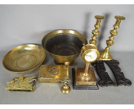 A collection of brassware to include a Mercedes clock, Chinese bowls, candlesticks, Chinese cigarette box and similar.