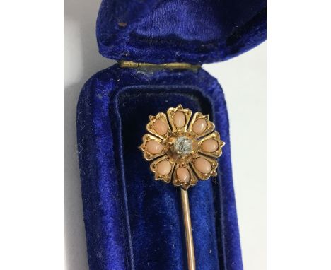 A superb gold stick pin set central diamonds and 'natural pearls?' in original case
