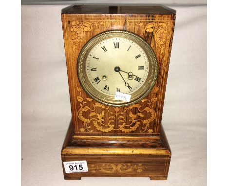 A French inlaid mantel clock