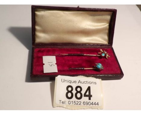 2 cased fine gold stick pins of insect form, one set turquoise and diamonds, the other set turquoise and seed pearls