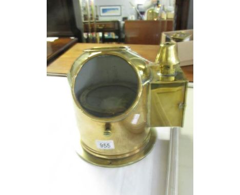 A brass binnacle compass