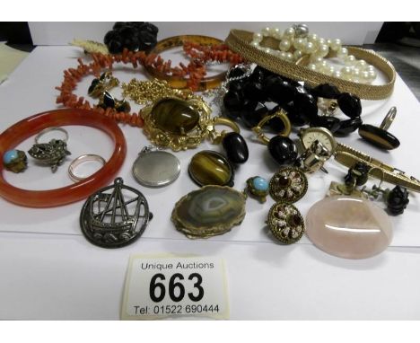 A mixed lot of vintage jewellery including silver, jet, coral etc