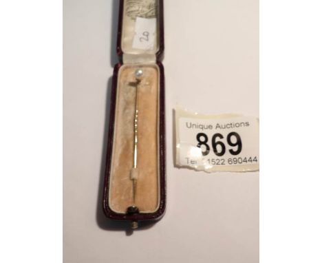 A cased gold stick pin set pearl