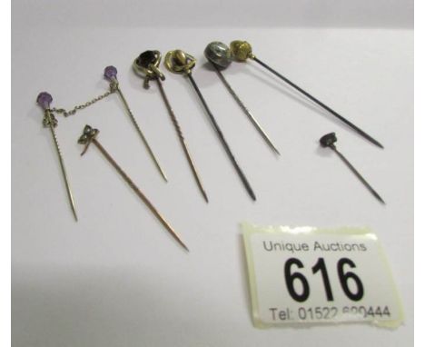 6 antique stick pins, one stamped C H (Charles Horner), 4 gold and 2 others