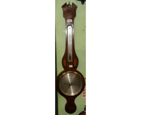 A mahogany inlaid wheel barometer, signed L Bellatti, Grantham, circa 1825, broken arched pediment, shell inlaid case with st