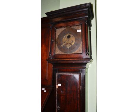 {} An oak eight day longcase clock, signed Robert Sutton, Skipton, circa 1730, flat top pediment, moulded trunk door, 12-inch