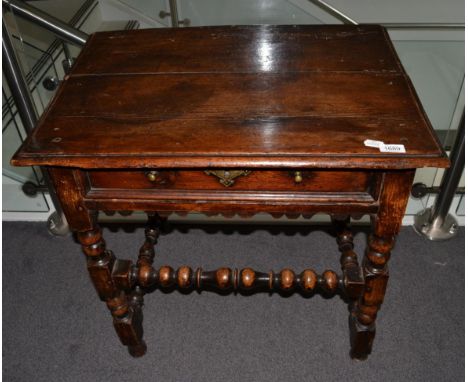{} A 17th century pine bobbin turned side table fitted with single drawer, 70cm wide  