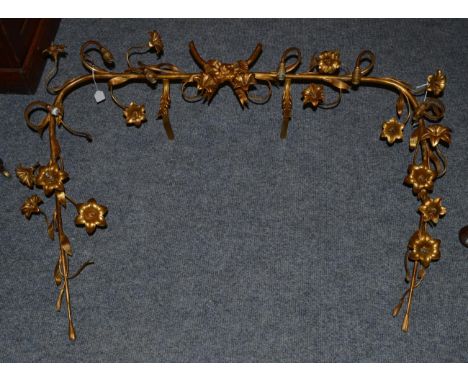 An Art Nouveau light fitting in the form of flower heads (a.f.) with six glass shades, maximum width 100cm   