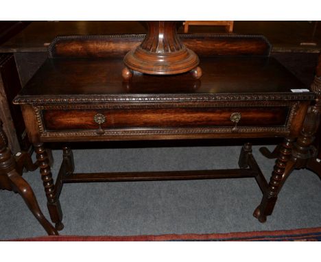 A 1920's oak bobbin turned hall table, 108cm wide 