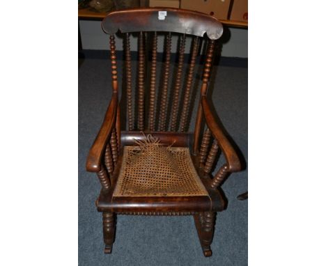 A fruitwood bobbin back rocking chair, 60cm wide 