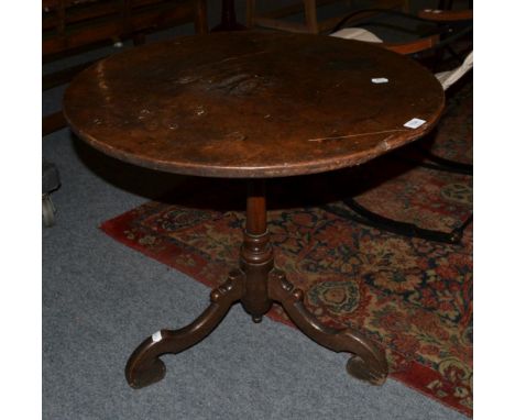 {} A George III oak tilt top tripod table, 70cm wide 