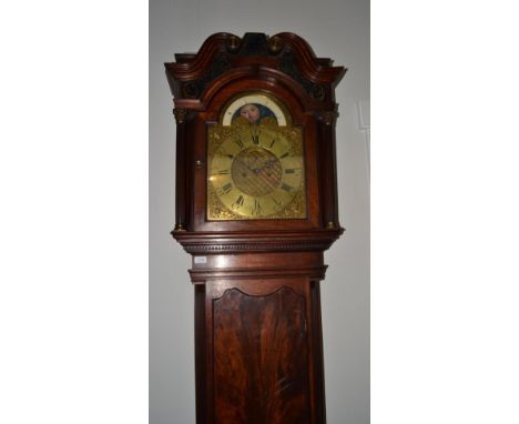 A mahogany eight day longcase clock, swan neck pediment with glass gilt painted panels and a central glass panel inscribed in